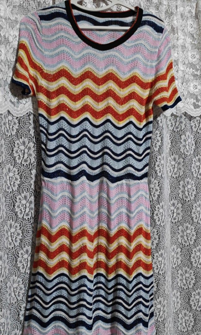 Wavy Zigzag Knit Midi Dress (Category: Dresses) located in Cavite. Submitted by MLstore (Listing ID 1440517306, Image 2). Description: - Eye-catching colorful wavy zigzag pattern - Midi dress length - Short sleeves and crew neck Medium to Large size - Stretchy, form-fitting knit fabric - Ideal for casual wear or beach vacations - Unique and stylish design.