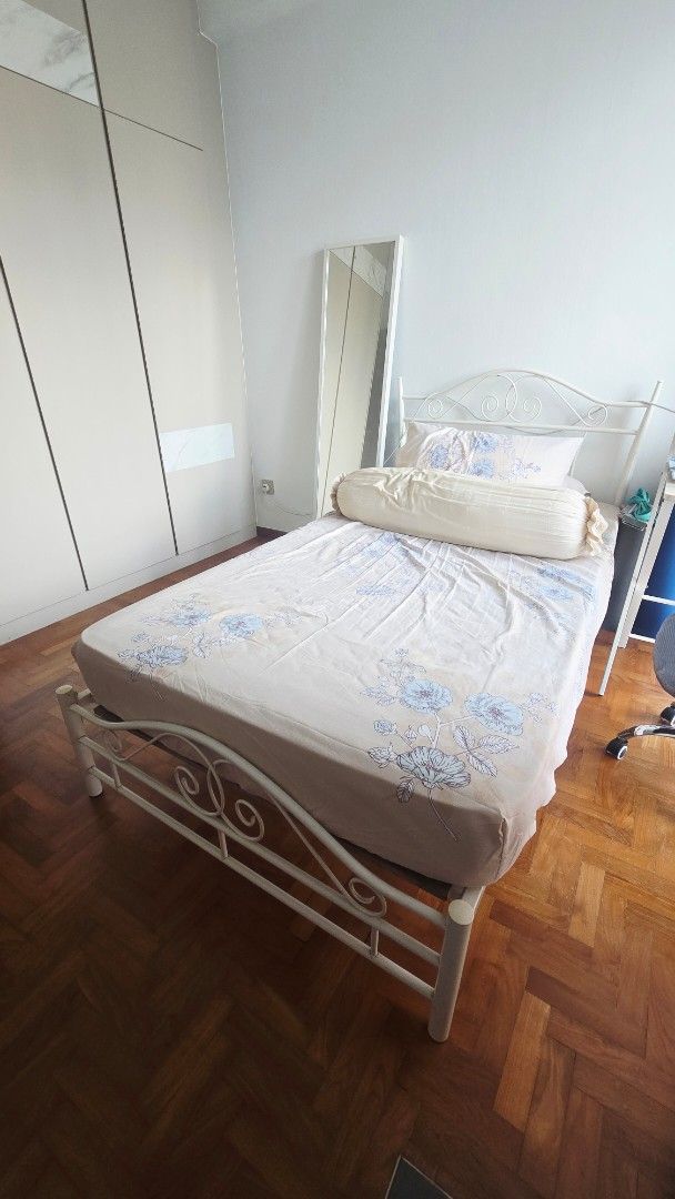 White Metal Bed Frame (Category: Bed Frames & Mattresses) located in Singapore. Submitted by zeecollezione (Listing ID 1440407132, Image 1). Description: - White metal bed frame - Features ornate scrollwork on headboard and footboard - Fits Super Single mattress size - Easy assembly process - Ready for its new home!.