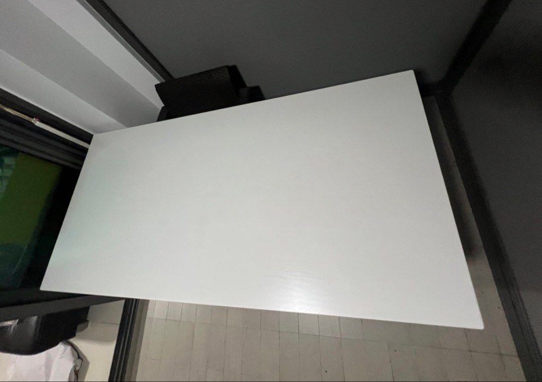 White Rectangular Dining Table - 180cm (Category: Tables & Sets) located in Singapore. Submitted by etkb076 (Listing ID 1440508377, Image 3). Description: - White rectangular table - Can use as a dining table or work desk - Original: 180cm (L) x 90cm (W) x 76.5cm (H) - Extended: 240cm (L) x 90cm (W) x 76.5cm (H) - Simple, clean design fits most interiors - Easy to maintain and clean surface - Ideal for family meals or study sessions.