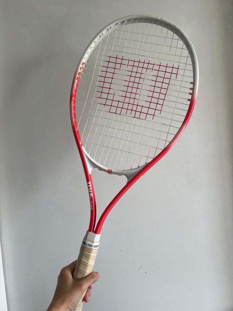 Wilson Envy XP Lite Tennis Racket (Category: Racket and Ball Sports) located in Paranaque City. Submitted by lorrainedeguzman (Listing ID 1440452559, Image 2). Description: - Wilson Envy XP Lite Tennis Racket - Grip Size: 4 1/4 - Color: White and Pink - Lightweight design, ideal for players looking for a lighter racket - Ready to play!.