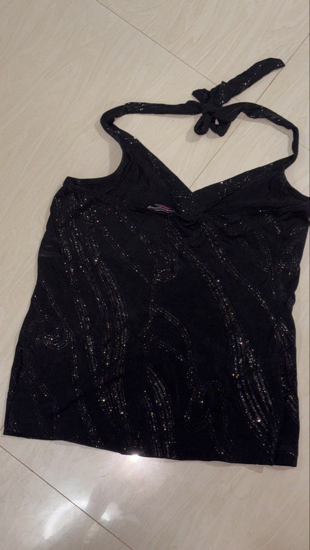 Y2K Decaf glitter Halter Top (Category: Sleeveless) located in Ozamiz City. Submitted by franchingkang (Listing ID 1440469226, Image 2). Description: - Black halter top - Features sparkly wavy lines all over - Ties at the neck for adjustable fit - Stretchy can fit up to Large .