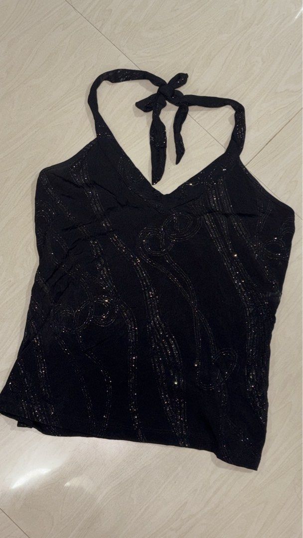 Y2K Decaf glitter Halter Top (Category: Sleeveless) located in Ozamiz City. Submitted by franchingkang (Listing ID 1440469226, Image 1). Description: - Black halter top - Features sparkly wavy lines all over - Ties at the neck for adjustable fit - Stretchy can fit up to Large .