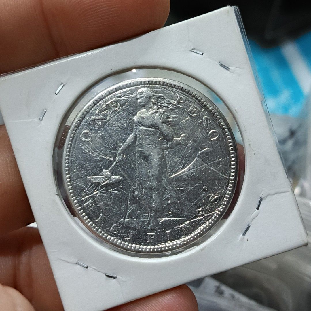 1912 US Philippines Silver Peso Coin (Category: Currency) located in Quezon City. Submitted by Coiners (Listing ID 1440595783, Image 2). Description: - 1912 US Philippines Silver Peso Coin - Features the 'S' mint mark - Excellent addition for coin collectors - Represents a piece of US-Philippines history.