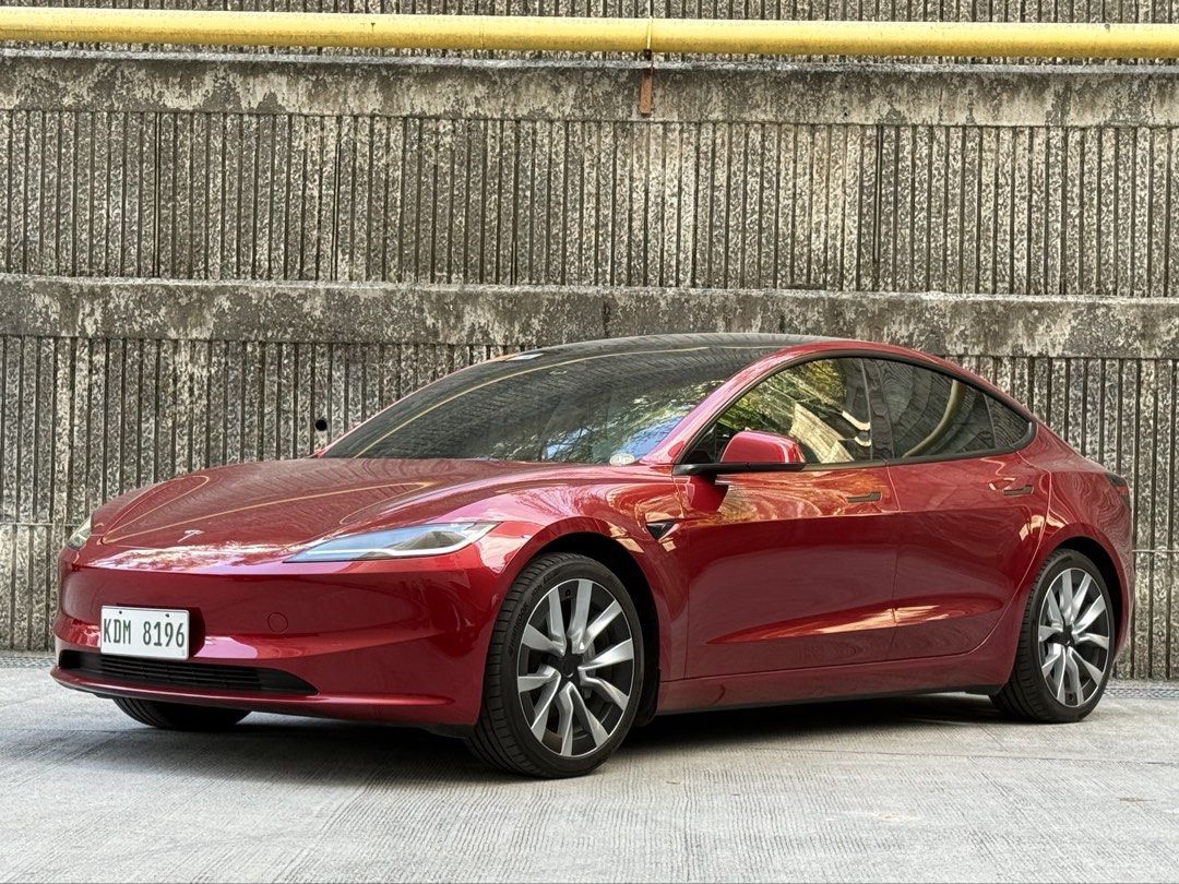 2025 Tesla Model 3 Dual Motor Long Range Auto (Category: Used Cars) located in Las Pinas. Submitted by peter09165089910 (Listing ID 1437359215, Image 2). Description: 2025 Tesla Model 3 Highland Long Range AWD ₱2,480,000 negotiable upon viewing Local unit Tesla BGC • Dual Motor 0-100kph 4.4 sec • Ultra Red + 146k • Black and White Premium interior + 66k • 19” Nova wheels + 99k • Paint Protection Film (PPF) • 10,000 kms mileage • under warranty at