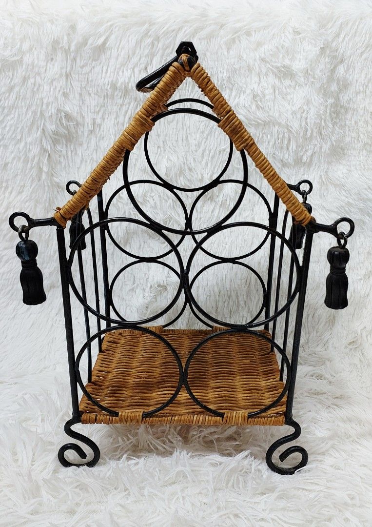 🍷✨ Wrought Iron Wine Rack ✨🍷 (Category: Wine Cellar & Storage) located in Binan City. Submitted by sakuratreasuresph (Listing ID 1440686566, Image 2). Description: 🍷✨ Wrought Iron Wine Rack ✨🍷 Keep your favorite wine bottles organized in style! 🖤 This decorative wine rack features a sturdy wrought iron frame with beautiful woven rattan accents — perfect for adding a rustic and classy touch to your space. 🍾🌿 📌 Features: 🍷 Durable wrought 