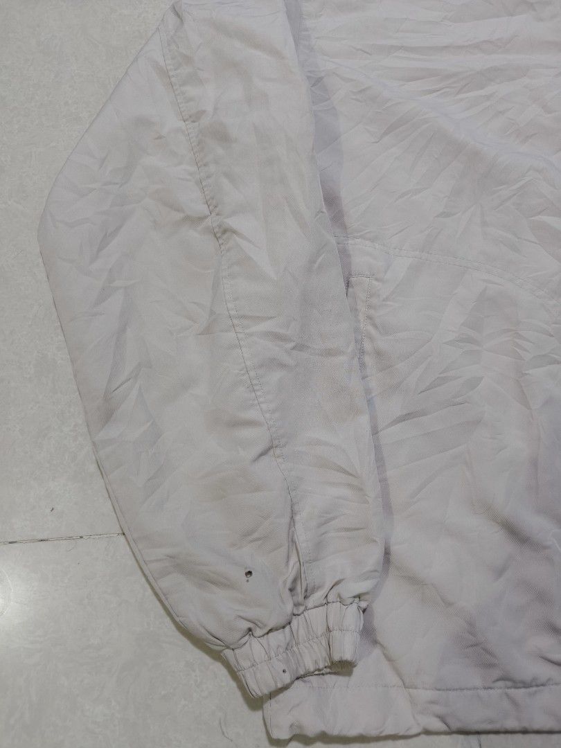 Adidas Vintage Windbreaker Jacket with 3 Stripes (Category: Coats, Jackets and Outerwear) located in Manila. Submitted by jamtnf (Listing ID 1440753039, Image 2). Description: - Classic Adidas Vintage jacket - Iconic 3 stripes on shoulders - Zip-up front with stand-up collar - Adjustable drawstring hem - Perfect for casual wear or sports - Issue small pinhole on sleeve (see 2nd picture).