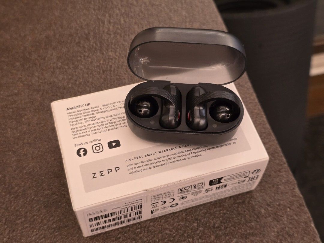 Amazfit UP Wireless Earbuds (Category: Earphones) located in Manila. Submitted by b166e5t (Listing ID 1440755336, Image 2). Description: ​Letting go of my Amazfit Up Open-Ear Earbuds in sleek black. Only lightly used, fully sanitized, and in very good cosmetic and working order. This is a fantastic budget-friendly alternative to premium clip-on open earbuds like the Bose Ultra Open or Shokz. ​Condition Breakdown: ​Earbuds: 9/10 — Very clean, zero