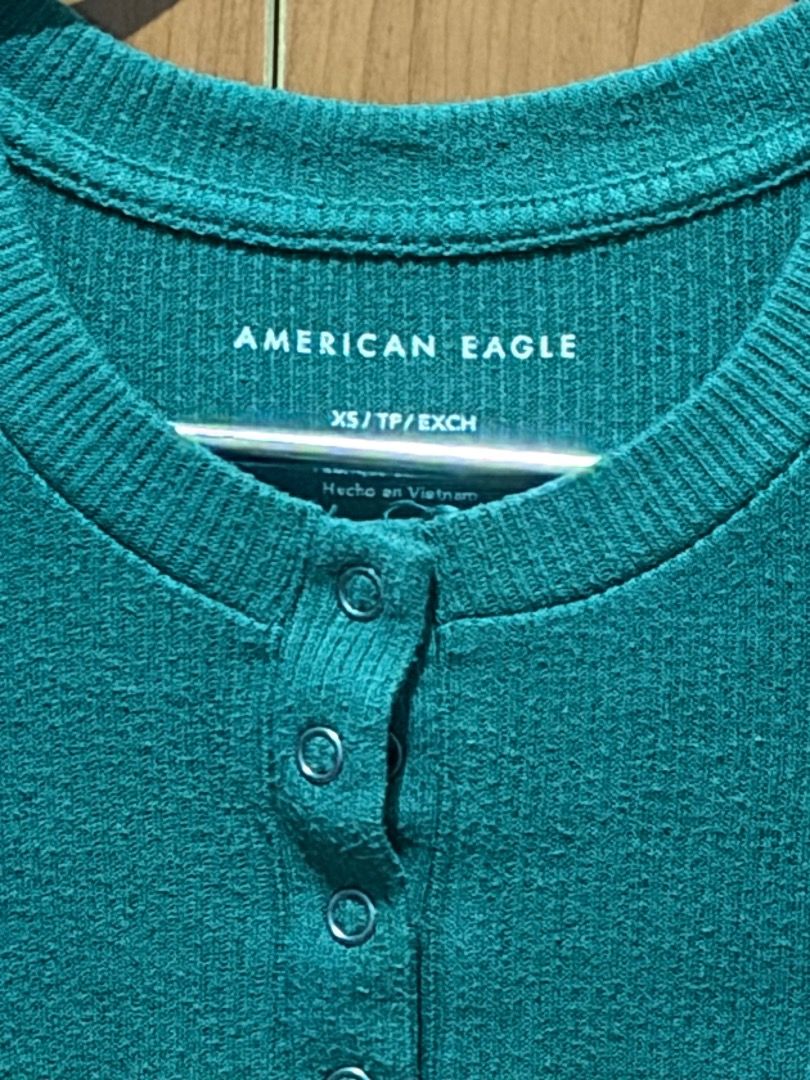 American Eagle Green Ribbed Henley Crop Top (Category: Shirts) located in Pasay City. Submitted by ianaxx.03 (Listing ID 1440695086, Image 2). Description: (Please take note that colors may differ due to lighting) IMPORTANT REMINDERS BEFORE ORDERING: 📌 NO RETURN, NO REFUND, NO EXCHANGE 📌MOP: Gcash 📦Shipping via GRAB or JNT 📦Shipping fee should be shouldered by customer 📍 Our location: Metro Manila, Makati City Shipping terms: 📦Once an order