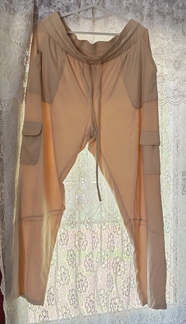 Amy B. Cargo Pants Beige (Category: Other Bottoms) located in Cavite. Submitted by MLstore (Listing ID 1440617693, Image 1). Description: - Beige cargo pants from Amy B. - Elastic waistband with drawstring for adjustable comfort. - Multiple pockets on front and sides -Passed as NEW but the tag is removed -Never been use -Comfy Fabric -Relaxed fit, ideal for everyday casual outfits. -XL (US sizing) on tag but I think it could fit to XXL WAIST - 36