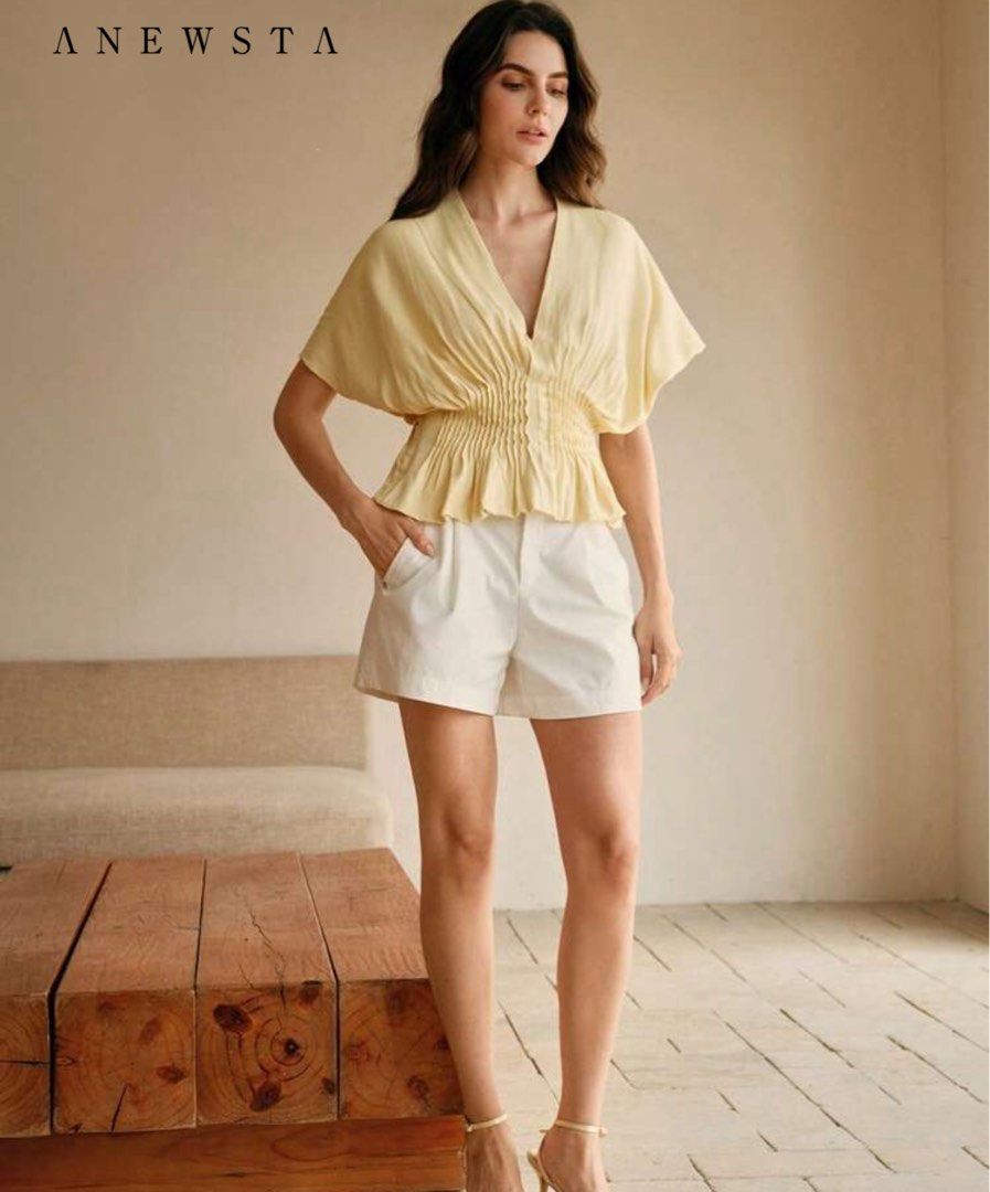 Anewsta Pleated Flutter Sleeve V-Neck Top (Category: Blouses) located in San Isidro. Submitted by kosfei (Listing ID 1440600960, Image 1). Description: can fit M help me clean up my closet >< all items are pre-loved, most are unused or worn only once! visit my ig @riclauset for more info ^^ .