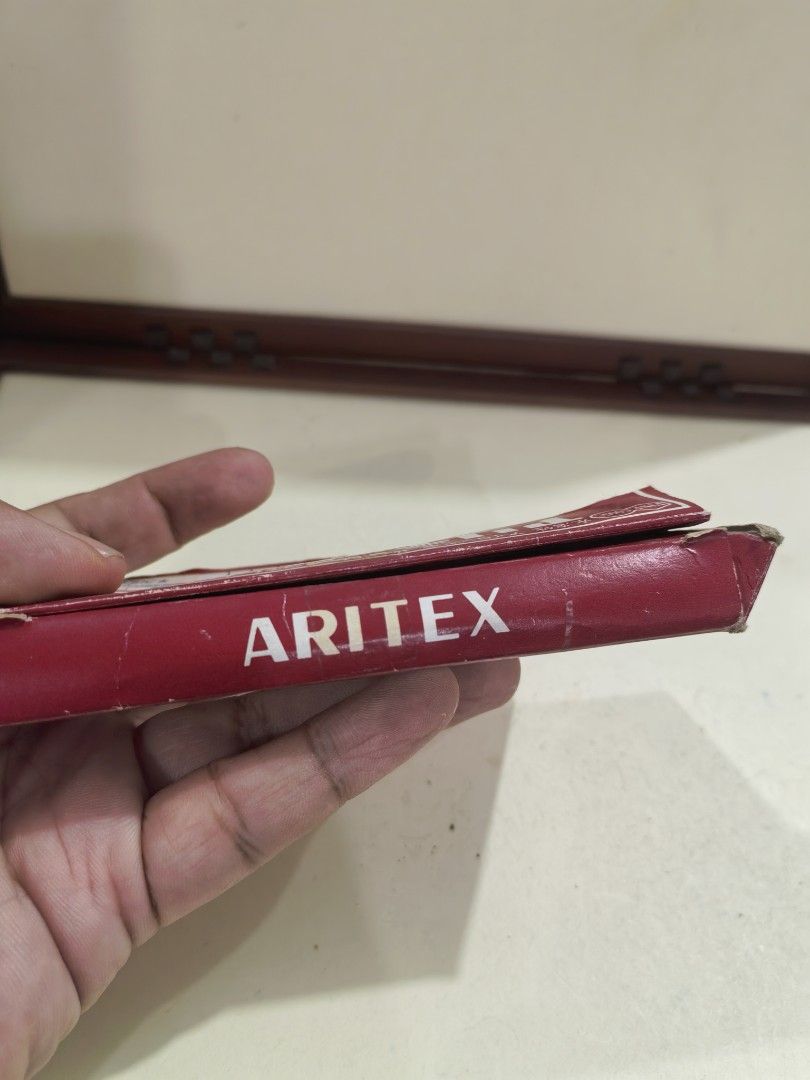 Aritex Fabric Paint Tubes (Category: Craft Supplies & Tools) located in Cebu City. Submitted by dudes_villanueva (Listing ID 1440581201, Image 3). Description: Aritex Fabric Paint Tubes Unused. Good as New. Damaged Box 📌 Brand: Aritex, a manufacturer associated with painting supplies. 📌 Type: The text on the tube indicates these are designed for use on fabric, stating they do not require ironing (アイロン不要). 📌 Context: The tubes are part of a set