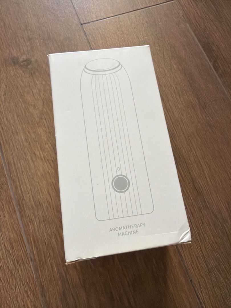 Aromatherapy Machine Diffuser (Category: Home Fragrance) located in Singapore. Submitted by peixuan30 (Listing ID 1440634249, Image 1). Description: - Brand new aromatherapy diffuser - Comes in original packaging - Sleek, modern design - Creates a relaxing atmosphere for home or office - Easy to operate - Ideal for essential oil lovers.