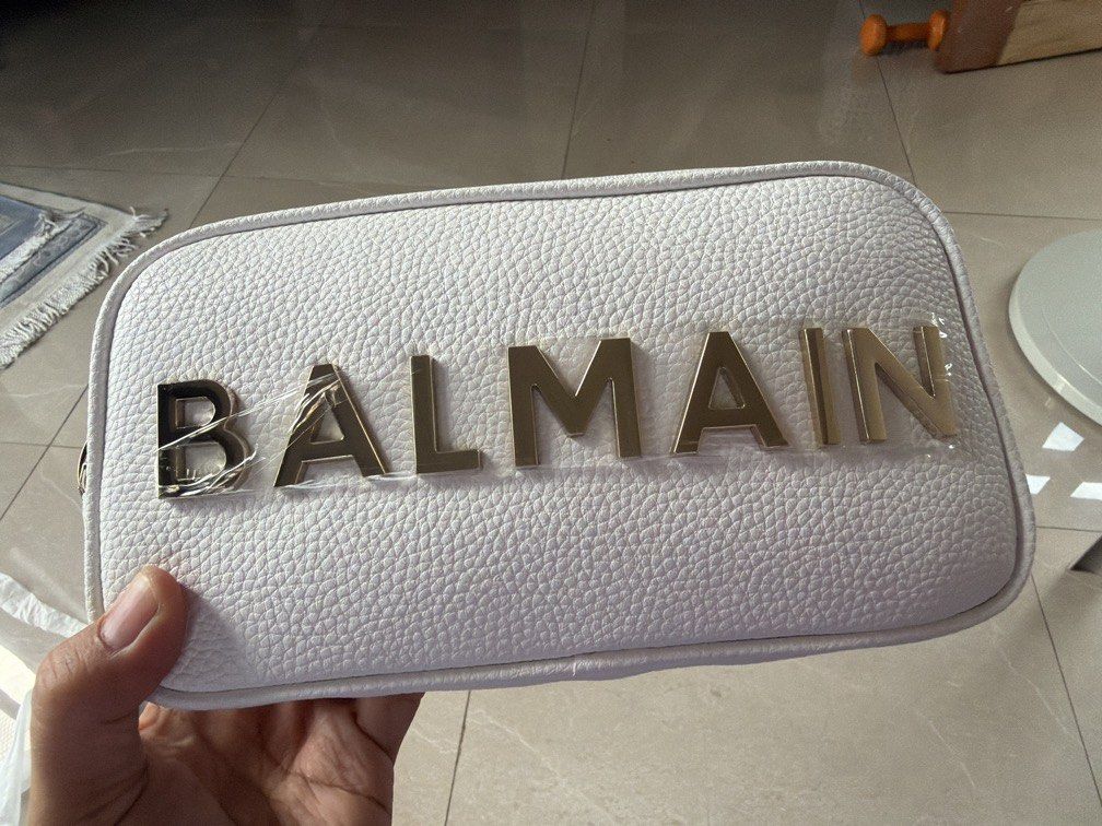 Authentic BNEW BALMAN crossbody in pebbled leather (Category: Luxury Bags & Wallets) located in Cagayan de Oro. Submitted by kenzeepie (Listing ID 1440601846, Image 1). Description: Bnew! Still With plastic film and tag! Bought jn Balmain Dubai With dust-bag and ecobag.