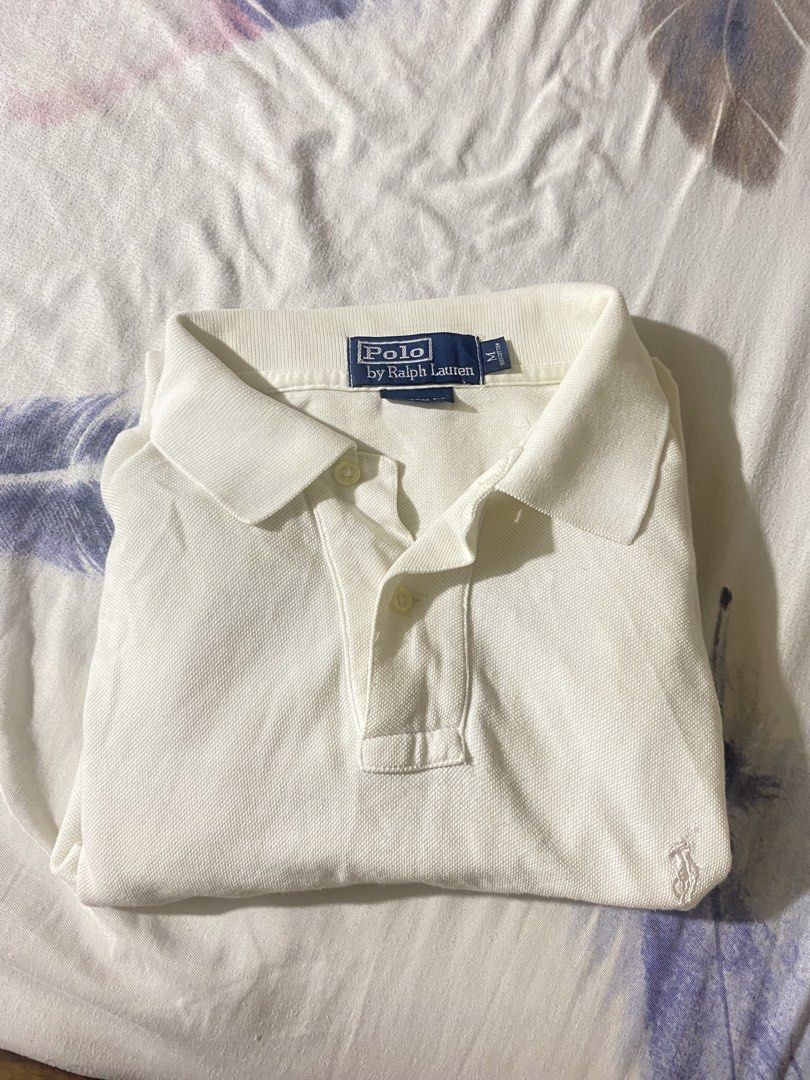 Authentic Polo Ralph Lauren White Metallic Silver Pony (Category: Tshirts & Polo Shirts ) located in Manila. Submitted by yanfy (Listing ID 1440729832, Image 3). Description: - issue: repaired slit and washable stain (because of my perfume) - condition: 9/10 - color rate: 10/10 - tags: complete tags - size: L - XL pm for more info!.