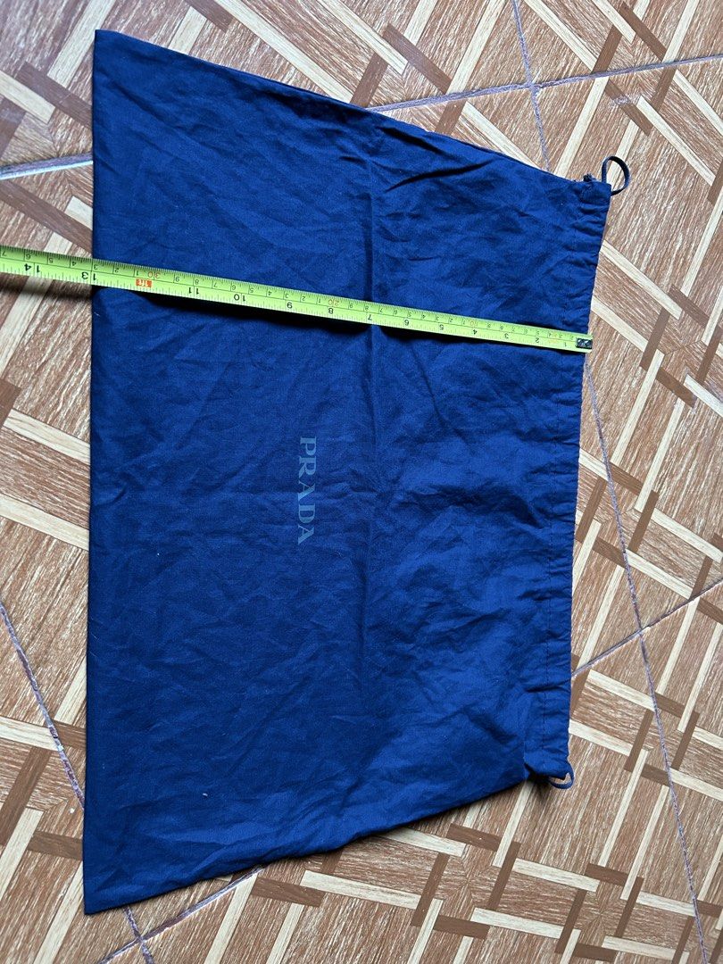 Authentic Prada, Gucci, Goyard Dust Bags Set (Category: Luxury Bags & Wallets) located in Baguio. Submitted by cleverlion_e92944 (Listing ID 1440630683, Image 3). Description: - Set of 3 authentic designer dust bags - Includes: 1 Navy Blue Prada, 1 White 13pcs dustbags Gucci, 1 Yellow Goyard - Ideal for protecting luxury handbags and shoes - Keeps your valuable items safe and dust-free.