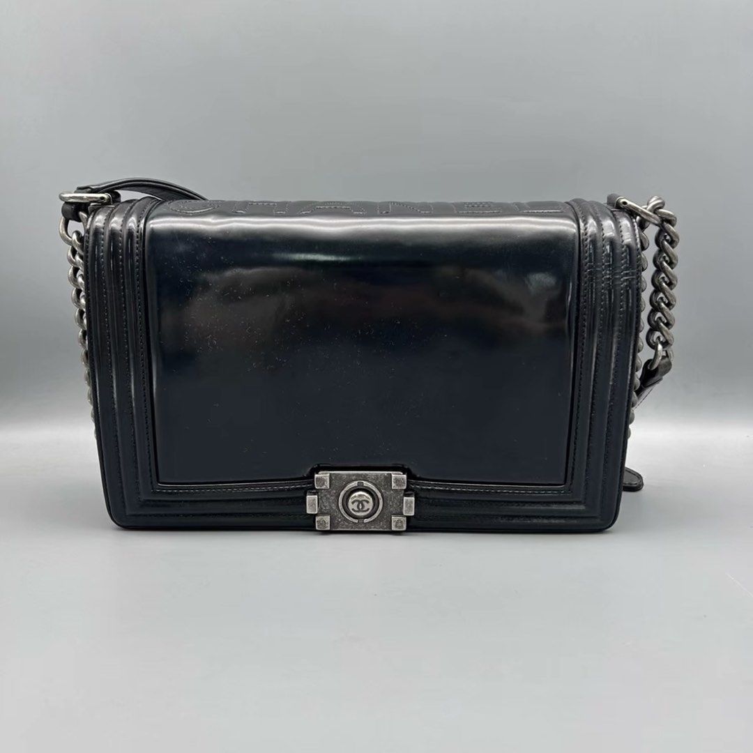 authentic.chanel Boy Bag Black Patent Leather (Category: Luxury Bags & Wallets) located in Caloocan City. Submitted by igt.luxury (Listing ID 1440705009, Image 1). Description: - Authentic Chanel Boy Bag - Material: Black patent leather - Finish: Glossy - Closure: Iconic Chanel CC turn-lock - Hardware: Silver-tone chain strap - Wearability: Shoulder or crossbody - Style: Classic and must-have for fashion enthusiasts.
