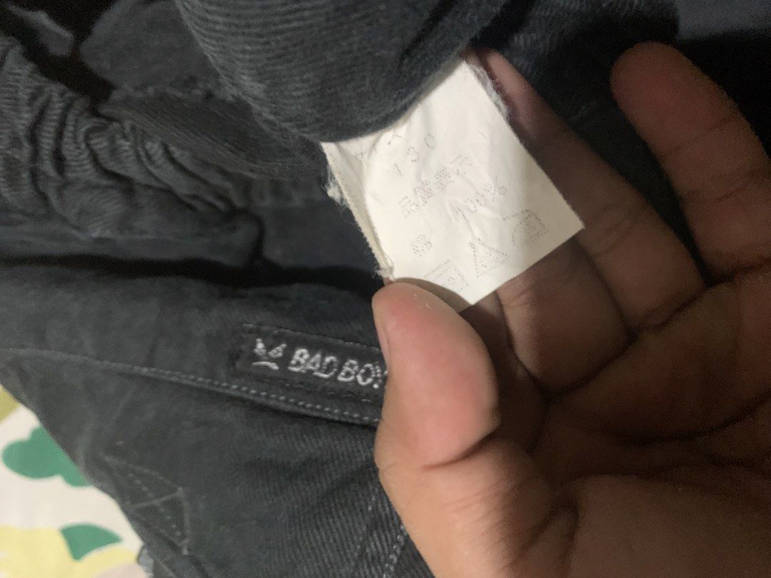 Bad Boy Cargo Shorts Black Men's Size 30 (Category: Shorts) located in Cagayan de Oro. Submitted by agboysalis60090 (Listing ID 1440711909, Image 3). Description: Black cargo shorts from Bad Boy. Multiple pockets for storage. Elastic waistband with drawstring. Button and zip fly. Great for casual wear or outdoor activities. Check measurements for best fit..