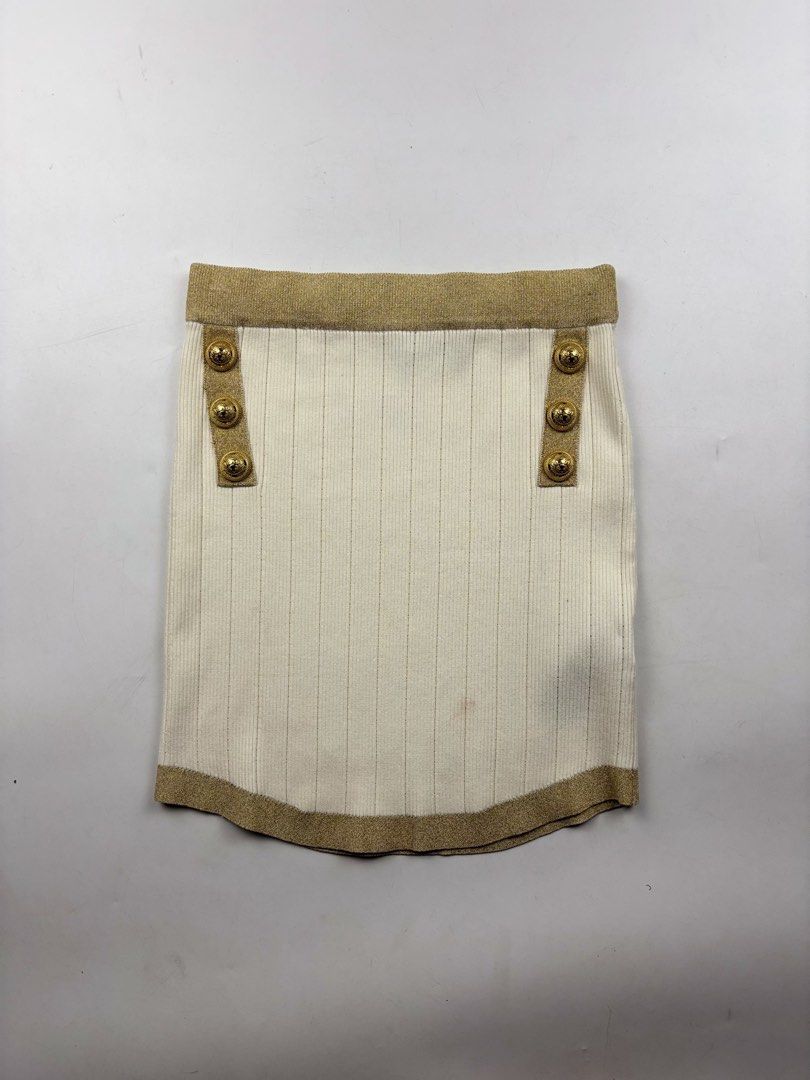 Balmain Embellished Knitted Mini Skirt (Category: Skirts) located in Makati City. Submitted by ragrepository (Listing ID 1440726671, Image 2). Description: Balmain Embellished Knitted Mini Skirt Tagged as 38 Waist-12-15” Length-15” Leg opening-13.5” Condition-9/10 Flaw-minor stain.