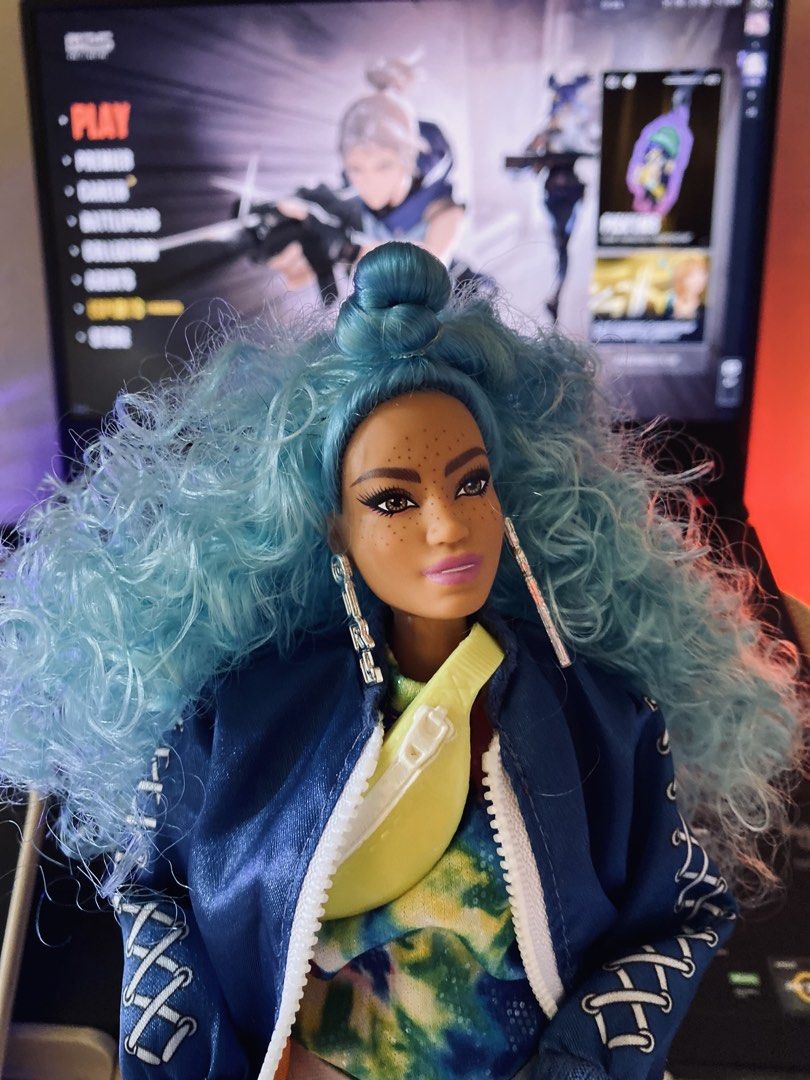 Barbie Extra #4 (Category: Kids Toys) located in Quezon City. Submitted by micah0920 (Listing ID 1440722567, Image 2). Description: - Vibrant blue curly hair - Trendy tie-dye top - White shorts - Stylish blue jacket - Fun yellow fanny pack - Chic heels - Ideal for collectors and playtime - Ready for a new home!.