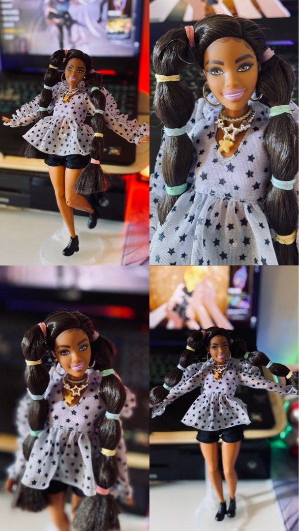 Barbie Extra #7 (Category: Kids Toys) located in Quezon City. Submitted by micah0920 (Listing ID 1440723369, Image 3). Description: - Barbie doll with long dark hair in pigtails. - Features a star-print top with ruffled sleeves. - Wears black shorts. - Accessories: hoop earrings and star pendant necklace. - Ideal for collectors and playtime..