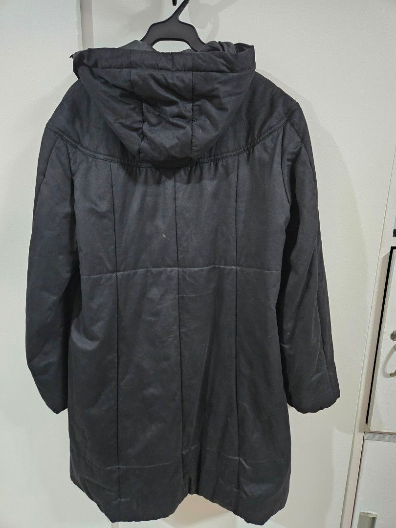 Black Hooded Puffer Trench Coat (Category: Coats, Jackets and Outerwear) located in Caloocan City. Submitted by rm.diaz (Listing ID 1440614776, Image 3). Description: - Black puffer Trench Coat - Attached hood - Zip-up front with button closure - Two front pockets - Lined interior - Ideal for cold weather and layering.