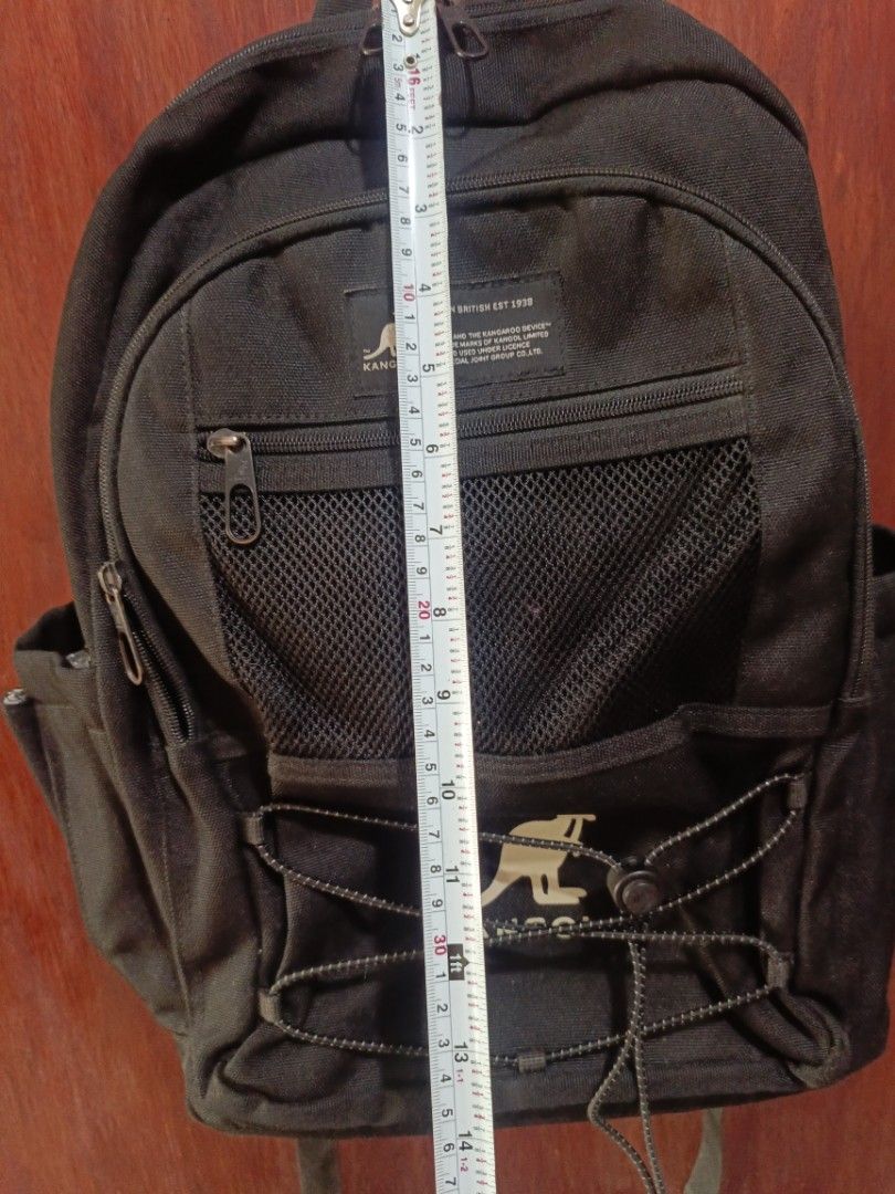 Black Kangol Backpack (Category: Backpacks) located in San Jose del Monte. Submitted by m_nshop (Listing ID 1440656432, Image 2). Description: - needs cleaning and washing Durable black Kangol backpack - Made with tough Cordura fabric - Multiple pockets and compartments for organization - Convenient mesh front pocket - Stylish bungee cord detail - Padded straps and back for maximum comfort - Ideal for everyday use or travel adveCOURIERneeds NO CO