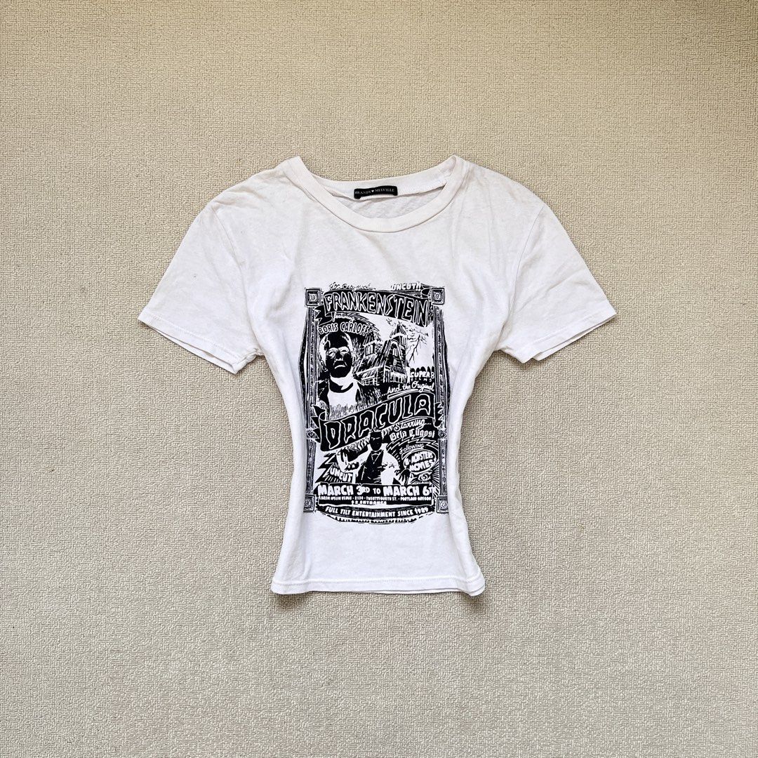 brandy melville frankenstein dracula print top (Category: Shirts) located in Limay. Submitted by budolfindsrawrawr (Listing ID 1440733966, Image 1). Description: brandy m. frankenstein dracula print top - fits s/m l20 b32 - comfy daily wear, cotton material.