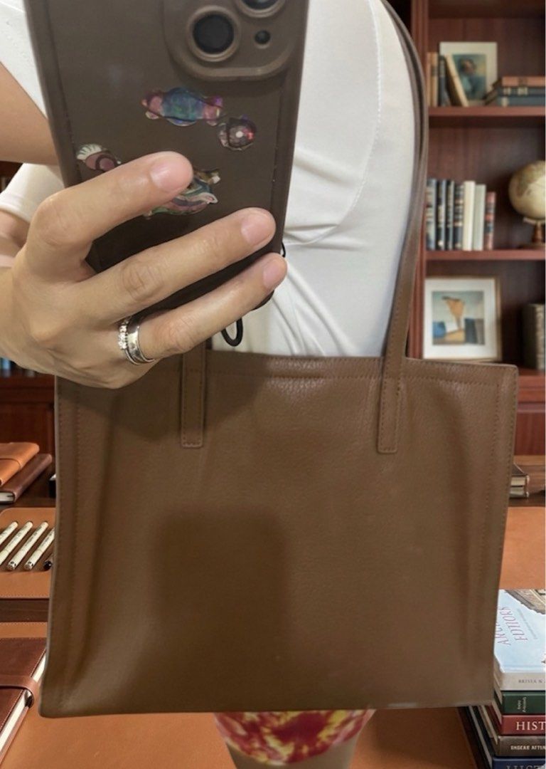 Brown vegan leather bag used twice (Category: Shoulder Bags) located in Pateros City. Submitted by mamamyaramosph (Listing ID 1440612451, Image 1). Description: Bought in Qatar. Used twice only. Not suitable for me .