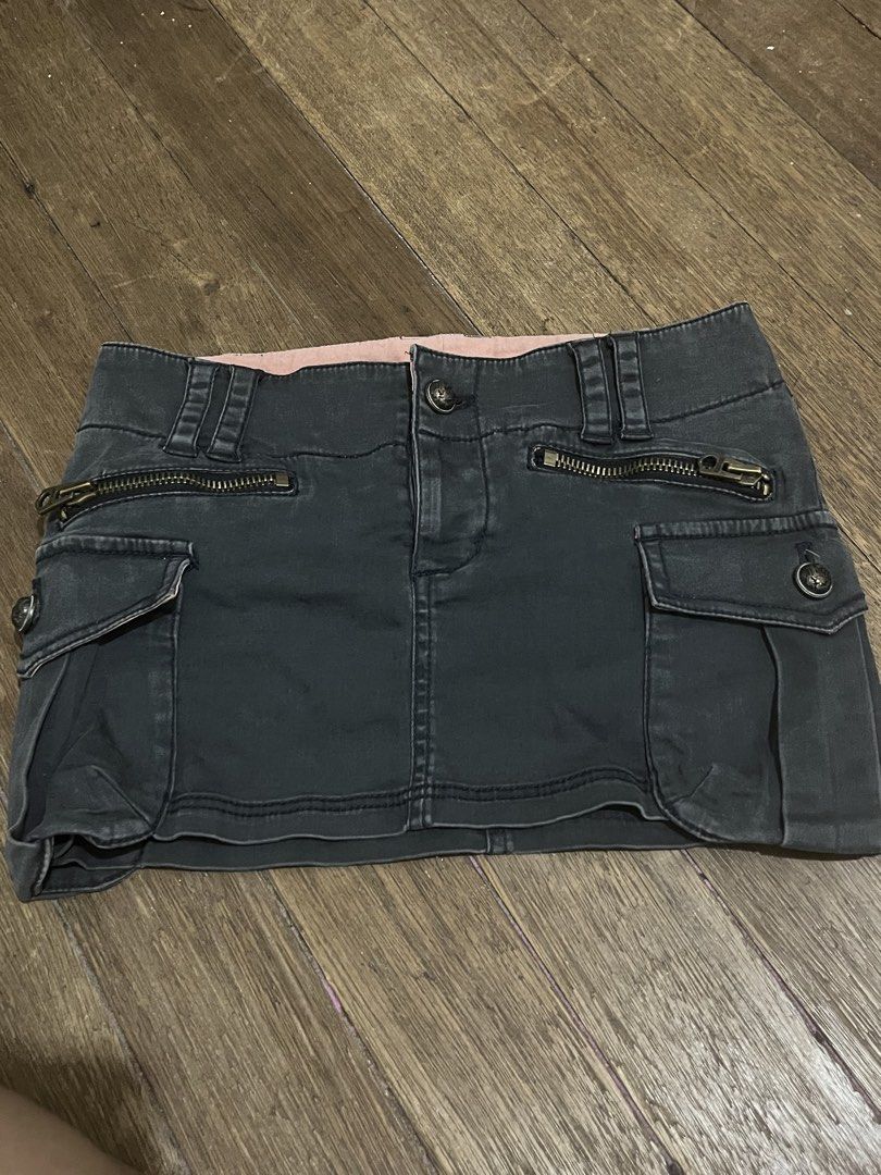 Cargo Micro Skirt (Category: Skirts) located in Taguig. Submitted by yvezntually (Listing ID 1440742935, Image 2). Description: - Cute dark grey cargo mini skirt - Pink lining - Multiple pockets and zippers for a cool, edgy look - Perfect for casual wear - Comfortable fit - Ready for a new home!.