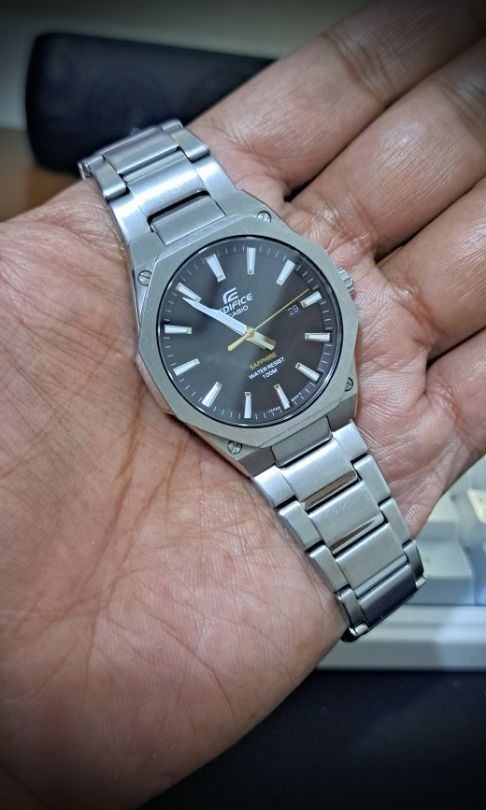 Casio Edifice EFR-S108D-1AV (Category: Men's Watches) located in Taguig. Submitted by akosidyordz (Listing ID 1440597061, Image 1). Description: This is a Casio Edifice EFR-S108D-1AV watch with a black dial and a slim 7.8 mm stainless steel case. Bezel and Crystal: Features a flat octagonal bezel with a hairline finish and scratch-resistant sapphire crystal. Water Resistance: Rated for water resistance up to 100 meters. Design Details: Includes a
