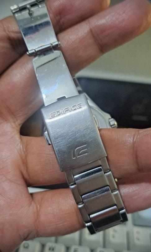 Casio Edifice EFR-S108D-1AV (Category: Men's Watches) located in Taguig. Submitted by akosidyordz (Listing ID 1440597061, Image 3). Description: This is a Casio Edifice EFR-S108D-1AV watch with a black dial and a slim 7.8 mm stainless steel case. Bezel and Crystal: Features a flat octagonal bezel with a hairline finish and scratch-resistant sapphire crystal. Water Resistance: Rated for water resistance up to 100 meters. Design Details: Includes a