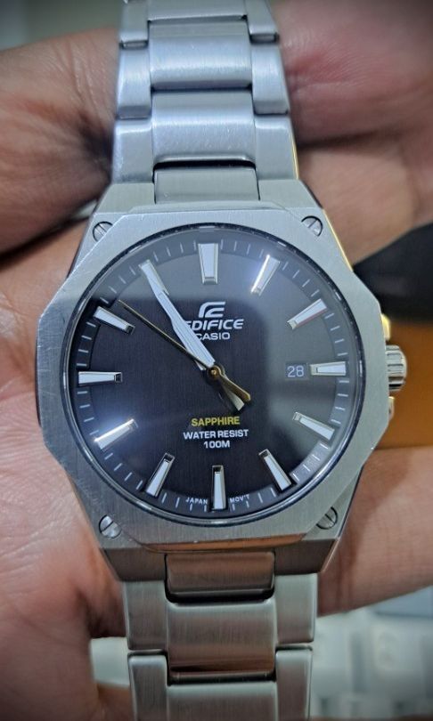 Casio Edifice EFR-S108D-1AV (Category: Men's Watches) located in Taguig. Submitted by akosidyordz (Listing ID 1440597061, Image 2). Description: This is a Casio Edifice EFR-S108D-1AV watch with a black dial and a slim 7.8 mm stainless steel case. Bezel and Crystal: Features a flat octagonal bezel with a hairline finish and scratch-resistant sapphire crystal. Water Resistance: Rated for water resistance up to 100 meters. Design Details: Includes a