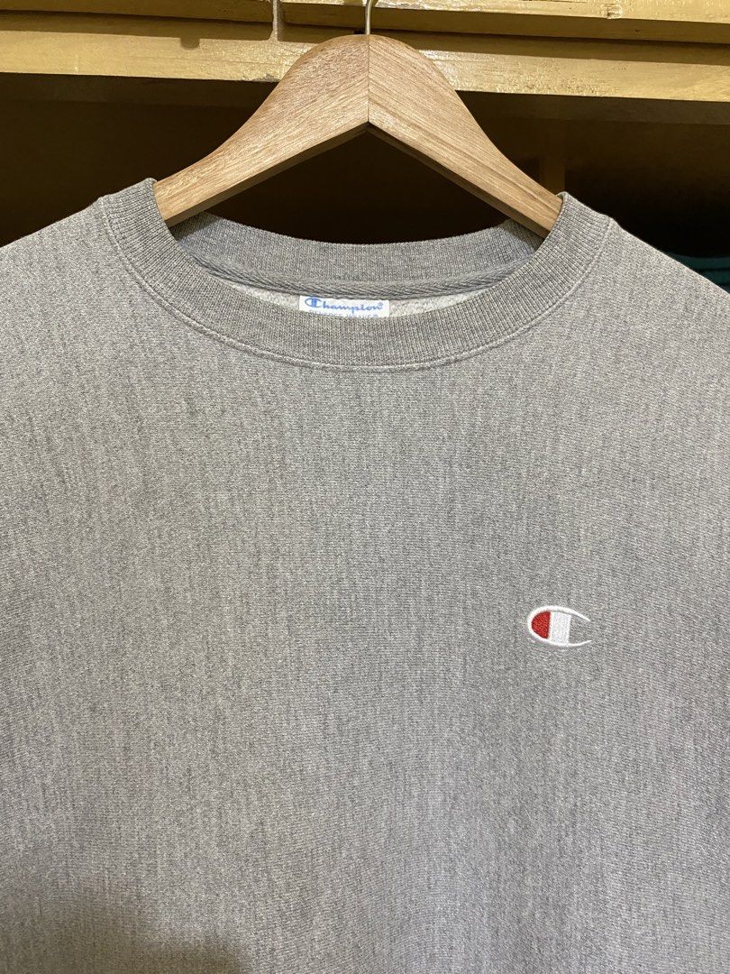 Champion Reverse Weave Gray Crewneck Sweatshirt (Category: Coats, Jackets and Outerwear) located in San Fernando. Submitted by rpgpieces (Listing ID 1440745529, Image 2). Description: ~ M on tag (W 22.5“ x 27.5” L) ~ Flaws: None ~ Heavyweight 📍Pampanga Payment method: Gcash Courier: J&T.
