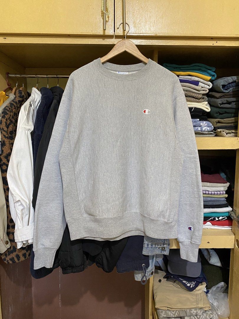 Champion Reverse Weave Gray Crewneck Sweatshirt (Category: Coats, Jackets and Outerwear) located in San Fernando. Submitted by rpgpieces (Listing ID 1440745529, Image 1). Description: ~ M on tag (W 22.5“ x 27.5” L) ~ Flaws: None ~ Heavyweight 📍Pampanga Payment method: Gcash Courier: J&T.