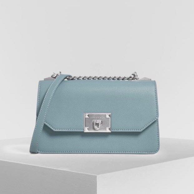 Charles & Keith Light Blue Textured Chain Shoulder Bag (Category: Cross-body Bags) located in Manila. Submitted by mitch_declutterzzz0713 (Listing ID 1440726472, Image 2). Description: - Original price is around 5k - Original Charles and Keith!! - Please check photos for flaws - Light blue textured crossbody bag - Brand: Charles & Keith - Silver chain strap and hardware - Main compartment with interior zip pocket - Versatile for casual or dressed
