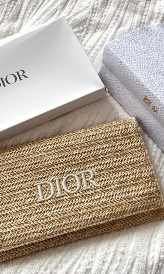 Christian Dior Raffia Pouch/Clutch Bag GWP (Category: Luxury Bags & Wallets) located in Cabuyao City. Submitted by marifyyy (Listing ID 1440730212, Image 1). Description: Yes. Can Fit pro max. No chain Included brand new, w/box 📍Cabuyao, Laguna 🚛 Shipment sched: Tue & Fri 🛻 Lalamove on nearby areas • Payment first • SF - cod or included na sa payment — if COD (SF) we only ship via LBC — For complete payment (w/sf), we can ship via LBC or J&T �