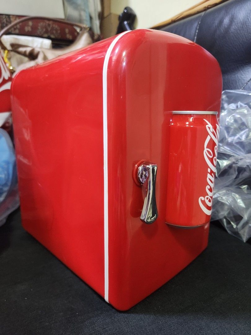 Coca-Cola Thermoelectric Cooler & Warmer mini fridge (Category: Food Organization & Storage) located in Pasig City. Submitted by js.authenticlux (Listing ID 1440705722, Image 2). Description: - Red Coca-Cola thermoelectric cooler and warmer - Ideal for storing drinks and fruits - Perfect for picnics, camping, or office use - Compact and portable design - Keeps items cool or warm on the go - Comes with power adapter and car adapter - call txt 0917