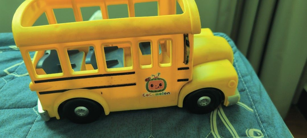 Cocomelon Yellow School Bus Toy (Category: Kids Toys) located in Taguig. Submitted by sgaur909 (Listing ID 1440585265, Image 1). Description: - Bright yellow Cocomelon school bus toy - Features the official Cocomelon logo - Interior seats are visible - Ideal for young fans of Cocomelon - Great for imaginative playtime.