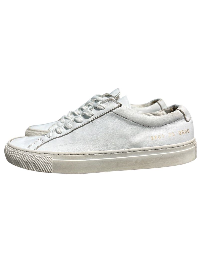 Common Projects Original Achilles Low White Leather Sneakers (Category: Sneakers) located in Cagayan de Oro. Submitted by thatsdopethrift (Listing ID 1440706596, Image 3). Description: Authentic Common Projects Original Achilles Low in White Leather. The ultimate luxury minimalist sneaker. This pair features the iconic gold foil serial numbers on the heels, confirming the style, size, and universal white color code. Made in Italy with premium cal