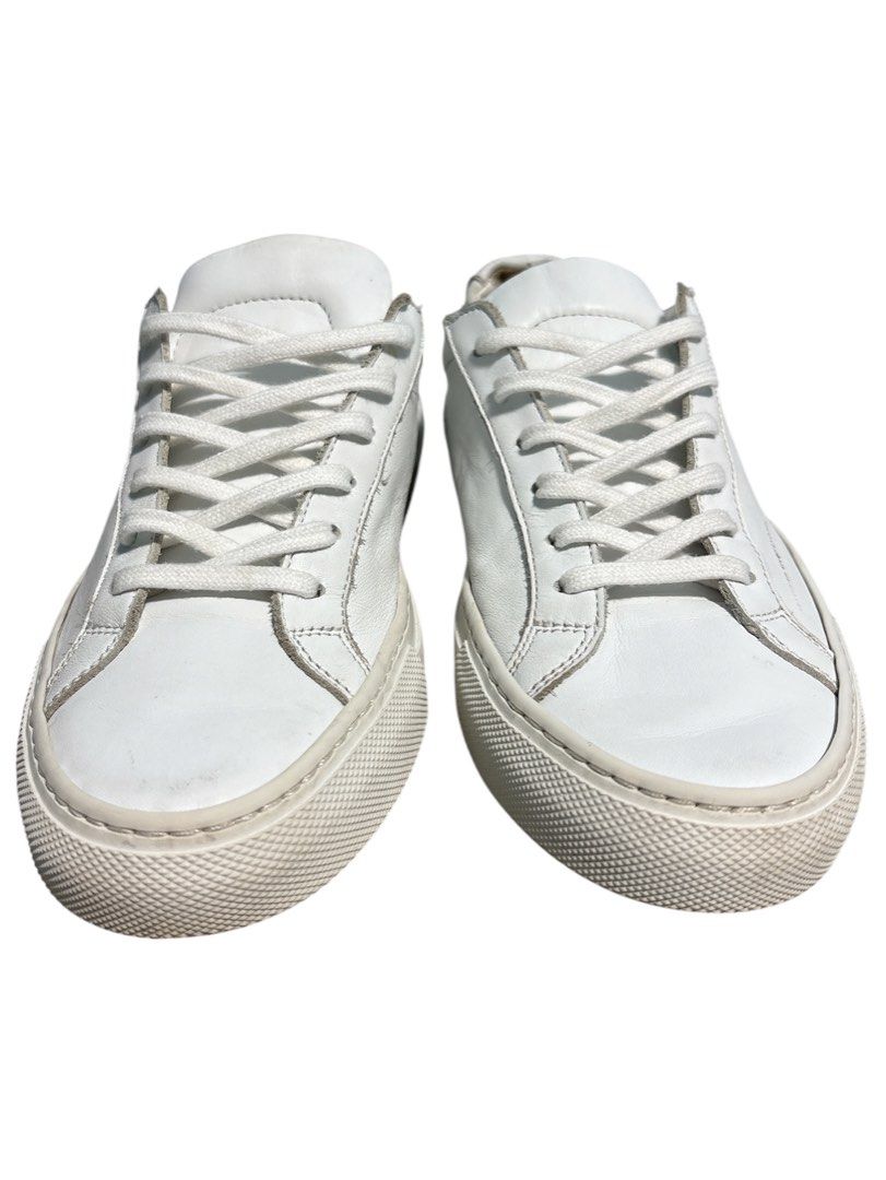 Common Projects Original Achilles Low White Leather Sneakers (Category: Sneakers) located in Cagayan de Oro. Submitted by thatsdopethrift (Listing ID 1440706596, Image 2). Description: Authentic Common Projects Original Achilles Low in White Leather. The ultimate luxury minimalist sneaker. This pair features the iconic gold foil serial numbers on the heels, confirming the style, size, and universal white color code. Made in Italy with premium cal