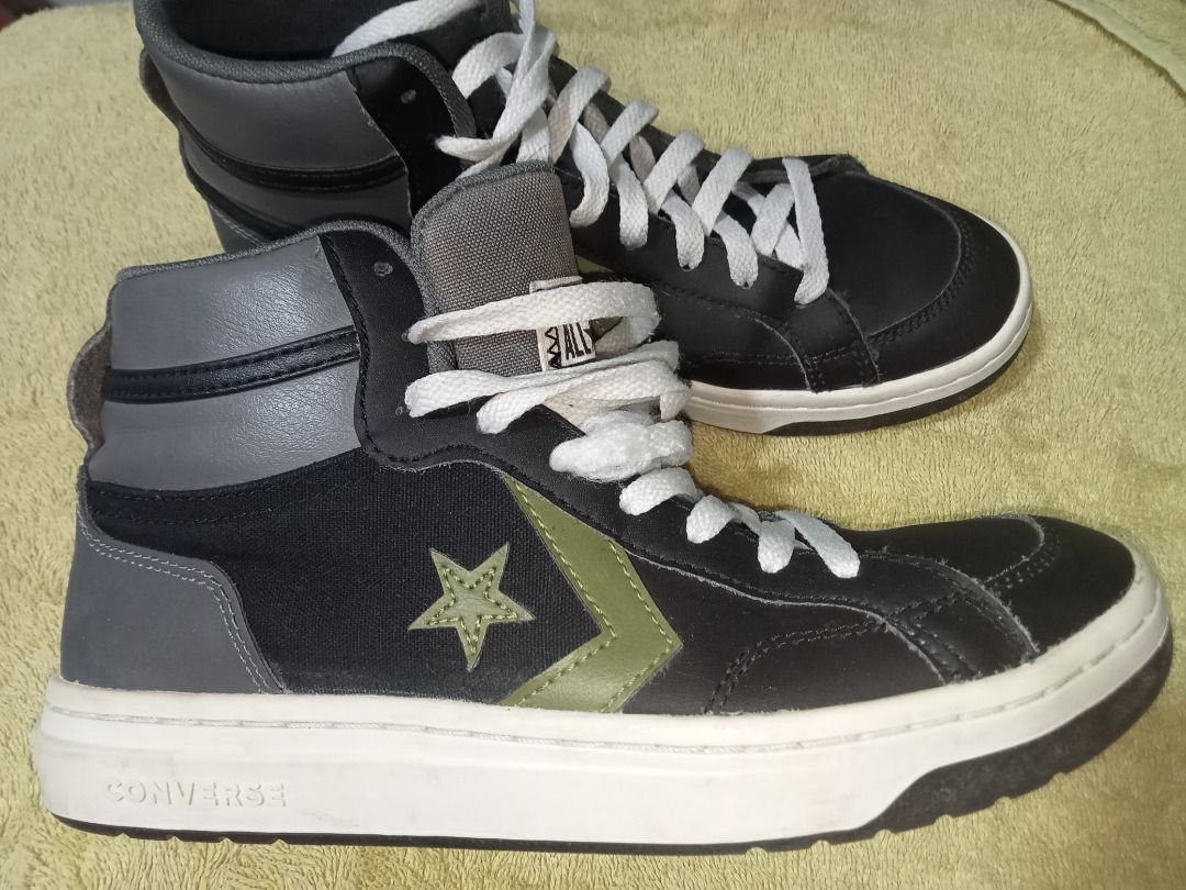 Converse Pro Leather High Top Sneakers Black Green (Category: Sneakers) located in Makati City. Submitted by mumebo (Listing ID 1440738863, Image 1). Description: - Converse Pro Blaze V2 mid sneakers - Color: Black and Gray with green accents - Features: Classic star logo, white laces - Size: Men's 7.5 - Ideal for: Casual wear or basketball - RFS: declutter .