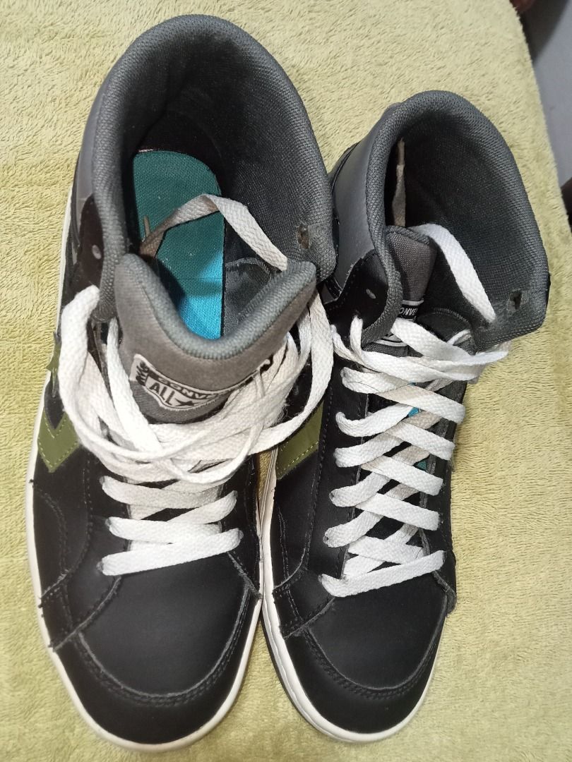 Converse Pro Leather High Top Sneakers Black Green (Category: Sneakers) located in Makati City. Submitted by mumebo (Listing ID 1440738863, Image 2). Description: - Converse Pro Blaze V2 mid sneakers - Color: Black and Gray with green accents - Features: Classic star logo, white laces - Size: Men's 7.5 - Ideal for: Casual wear or basketball - RFS: declutter .