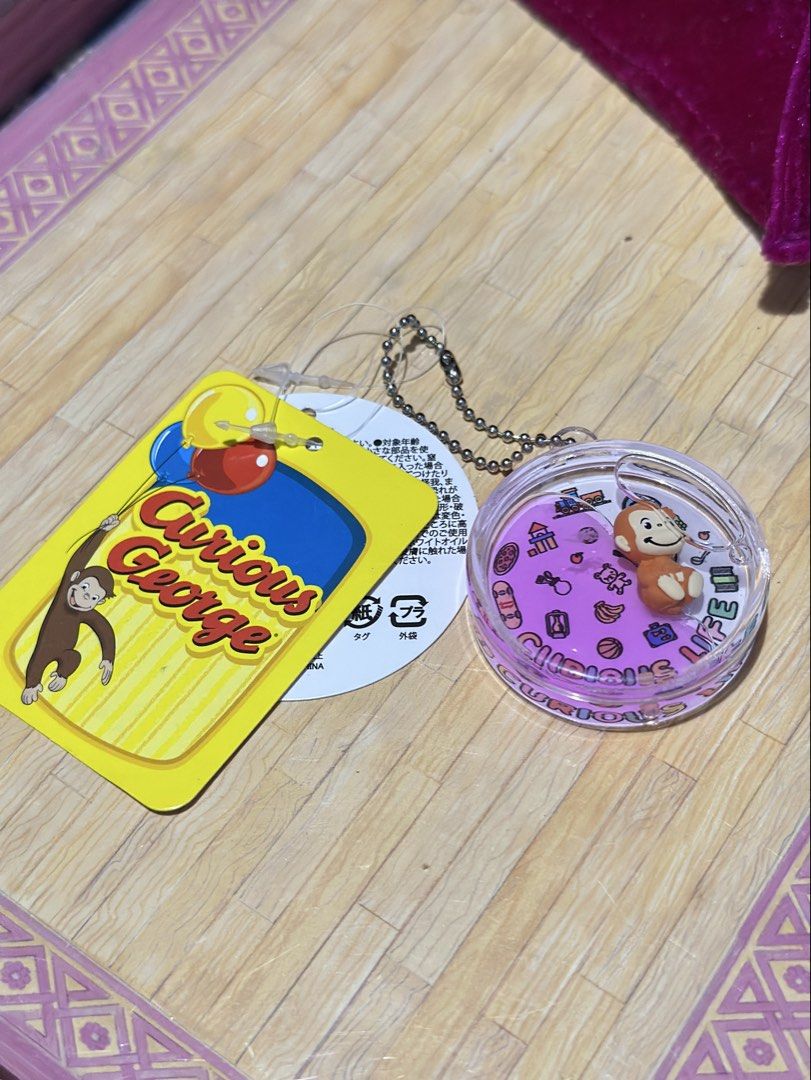 Curious George Keychain Charm (Category: Toys & Games) located in General Santos City (Dadiangas). Submitted by toysville888 (Listing ID 1440690506, Image 1). Description: Original Curious George Keychain. brand new with tags. best for gift ideas.