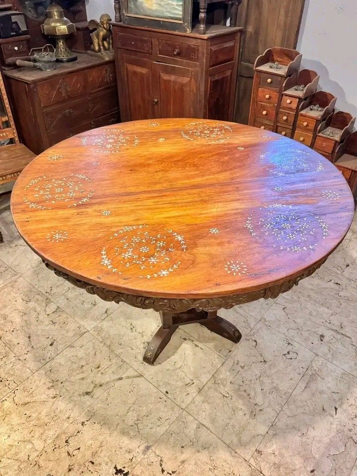 Dining table set (Category: Tables & Sets) located in Manila. Submitted by carmelites36250 (Listing ID 1440689862, Image 2). Description: Vintage 5 Seater Narra Dining Set with Inlay Table Diameter: 48 inches Chair Height : 44 inches Chair Length: 15.5 inches Chair Width: 16 inches ₱18, 500.