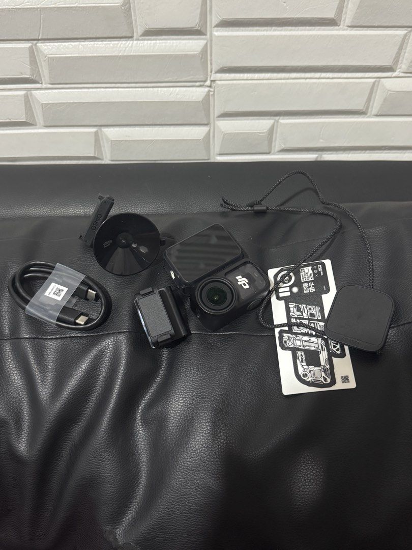 DJI Osmo Action Nano Standard Combo 128GB (Category: Cameras) located in Manila. Submitted by squirtybabyy (Listing ID 1440723274, Image 3). Description: DJI Osmo Action Nano (Standard Combo) - Includes 128GB storage - Records in crisp 4K resolution at 60fps - Features a wide 143° Field of View (FOV) - All accessories pictured are included - Used twice only, bought last April.