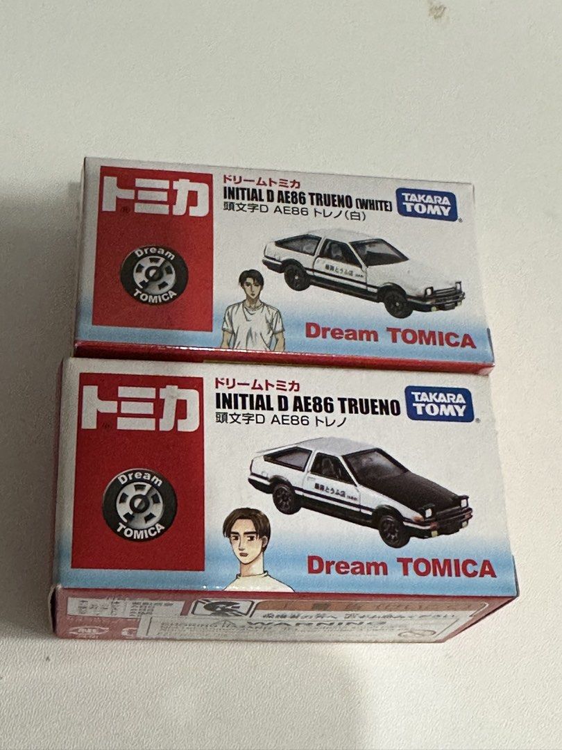 Dream Tomica Initial D AE86 Trueno SET (Category: Vehicle & Diecast Models) located in Las Pinas. Submitted by tophiers (Listing ID 1440639185, Image 1). Description: SET ONLY ( will not reply to break set and how much ) - Set of 2 Dream Tomica Initial D AE86 Trueno (White) diecast cars - Authentic Takara Tomy product - Iconic white AE86 Trueno model from the Initial D series - Ideal for collectors and fans of Initial D - Both cars are in their o