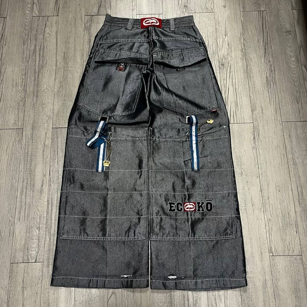 Ecko reflectorize baggy pants (Category: Jeans) located in Binmaley. Submitted by 88basement (Listing ID 1440635787, Image 1). Description: Ecko reflectorize baggy pants Waist: 26” Length: 40” Thigh: 12“ Leg opening: 12“ Check and zoom pics for the details and condition of the item -dirt on back pocket strap, minor scratch on heel.