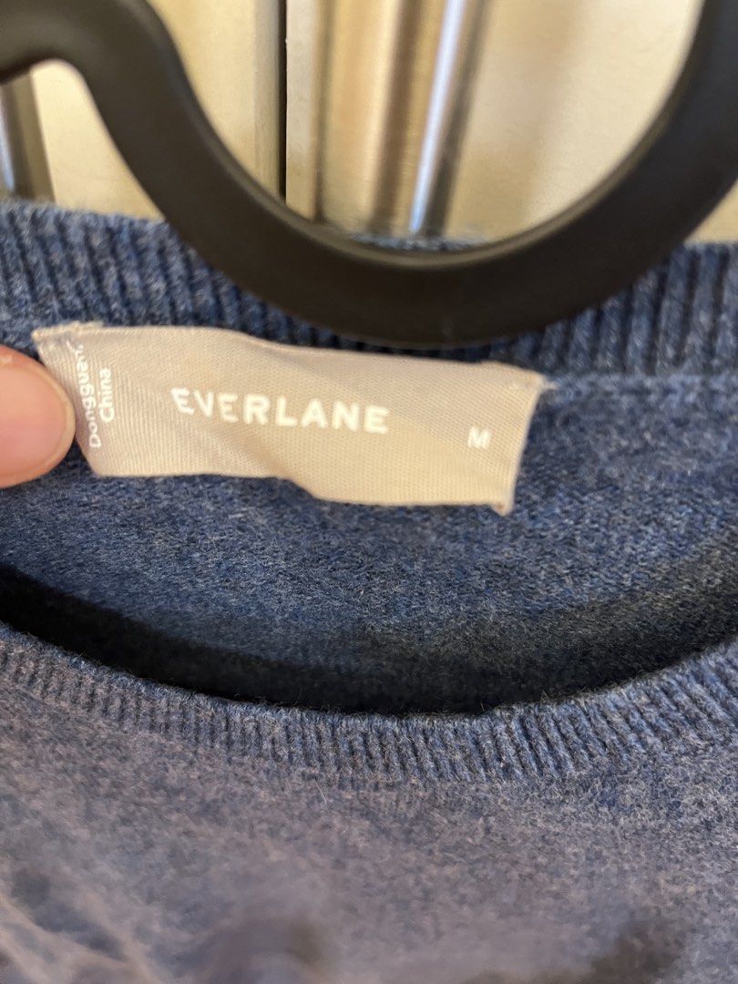 Everlane Blue Crewneck Sweater Size M (Category: Longsleeves) located in Makati City. Submitted by hikat01 (Listing ID 1440673971, Image 2). Description: - Brand: Everlane - Color: Blue - Style: Crewneck Sweater - Size: Medium (M) - Material: Heathered knit texture - Features: Simple, classic design - Versatility: Great for layering or wearing on its own - Styling: Easily pairs with jeans or trousers.