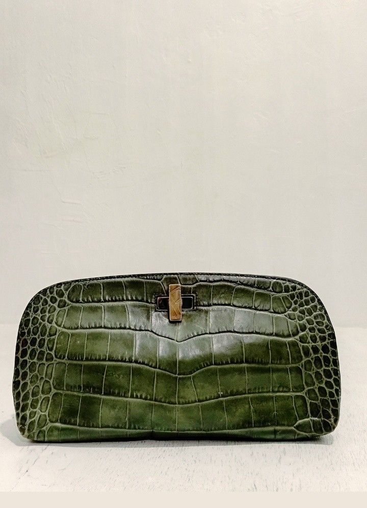 FURLA Green Crocodile Embossed Elegant Clutch (Category: Luxury Bags & Wallets) located in Navotas City. Submitted by ms.soulana (Listing ID 1440599343, Image 3). Description: PreOwned Lightly Used FURLA Croc Embossed leather Elegant green clutch Pouch - Crocodile embossed texture - Secure Silvertone clasp closure - Compact, curved shape - Ideal for evenings and special occasions - Fits phone, cards, and lipstick Sign of Used Min Rubs sa Croc Lea