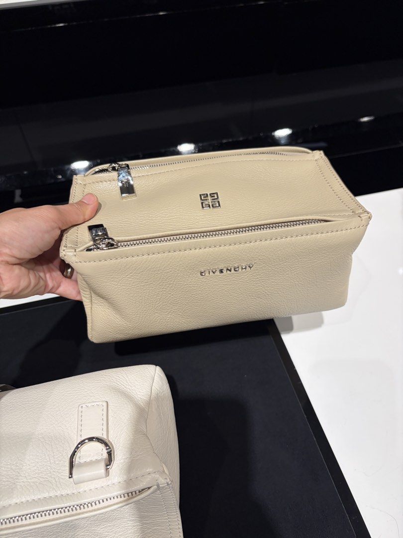 Givenchy Mini Pandora Beige Leather (Category: Luxury Bags & Wallets) located in Taguig. Submitted by ellejay8 (Listing ID 1440678408, Image 1). Description: - Brand New Authentic Givenchy beige leather cross body bag - Complete with paper bag and dust bag - Two zippered compartments for secure storage.